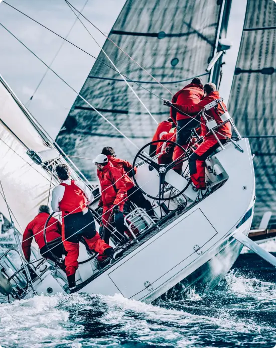 Team of sailors representing due diligence experts navigating tech challenges.