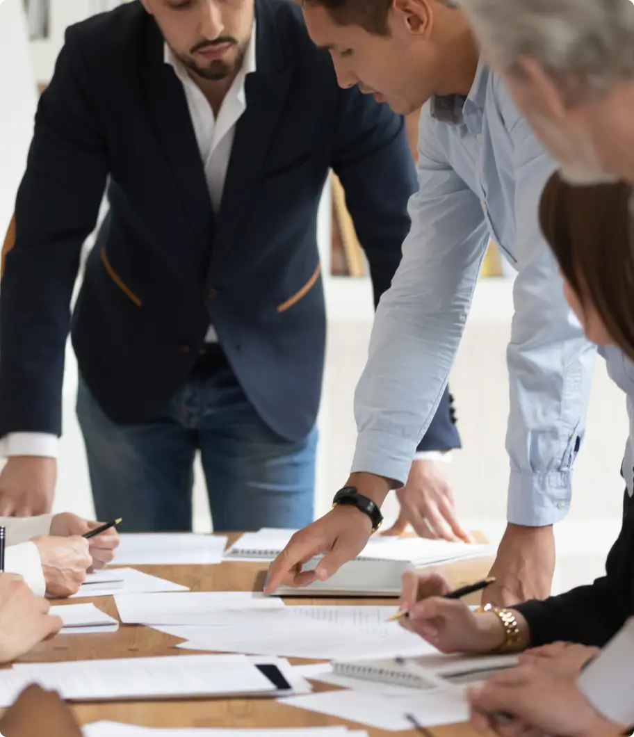 MNA DD Solutions consultant presenting Post-Acquisition Technology Strategy plan to leadership team